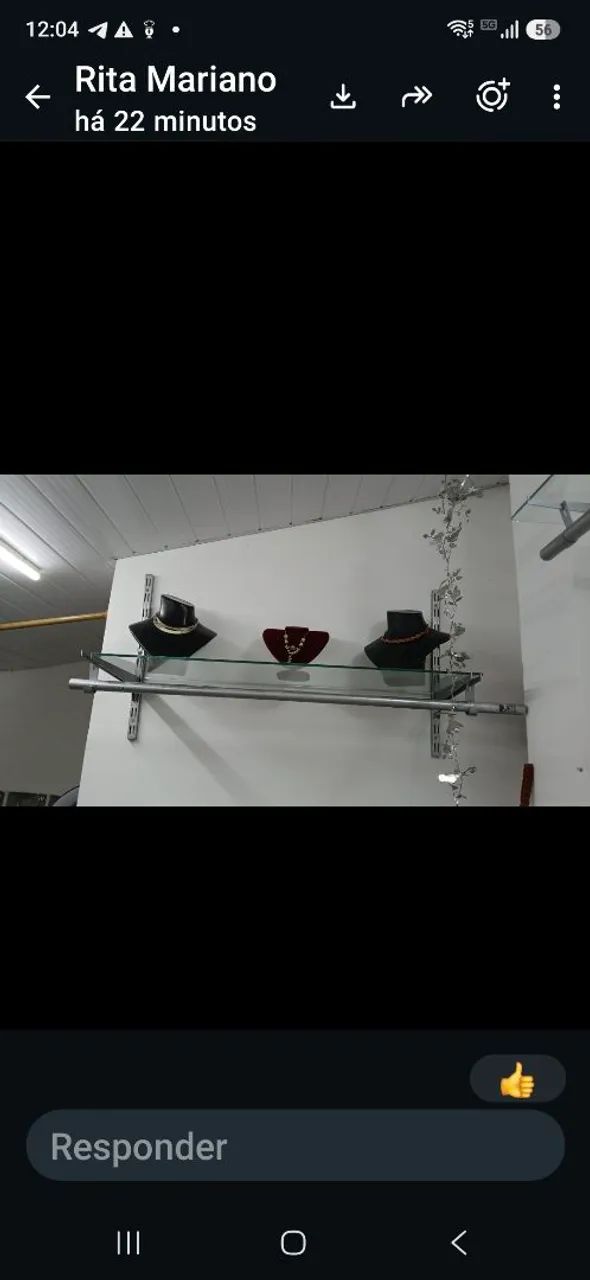 Arara com prateleira de vidro