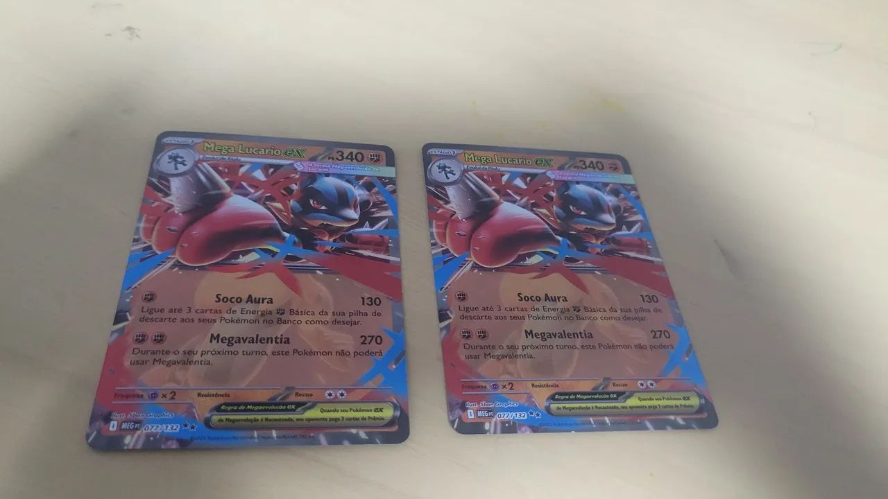 Pikachu Vmax 310 de poder mais 2 mega lucario ex 340 de poder