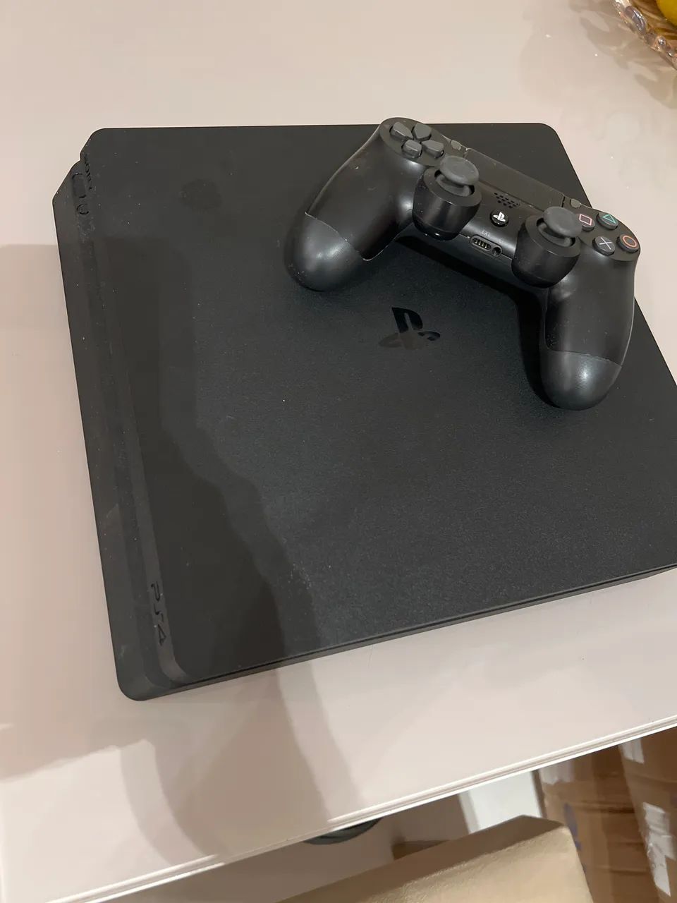 PlayStation 4 pouco usado