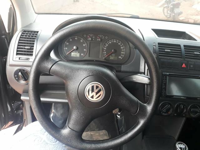 Troco em moto com volta pra mim vw polo sedam completao - Foto 3