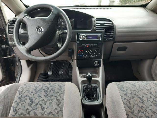 Zafira 7 lugares + GNV raridade - Foto 11