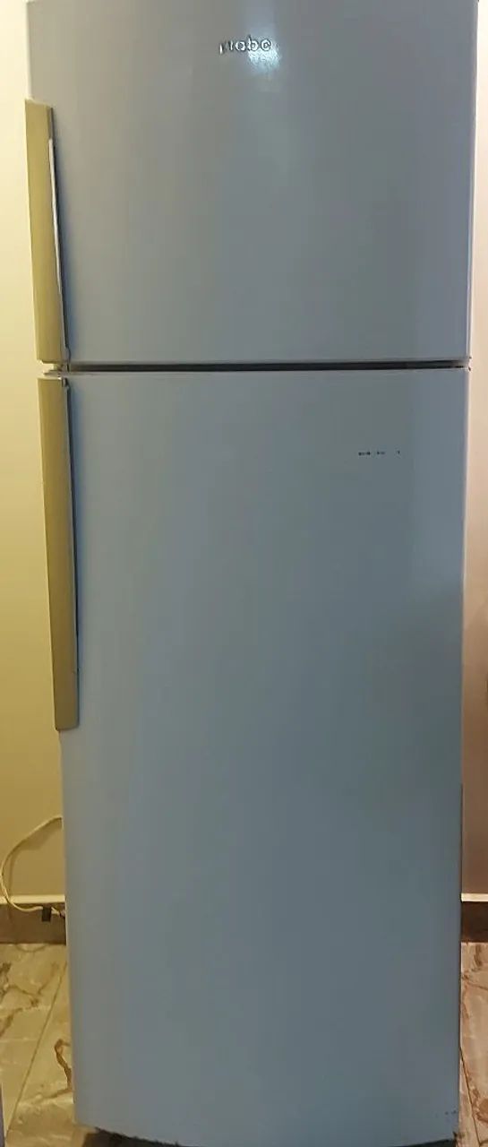 VENDO UMA GELADEIRA USADA, VOLTAGEM 127, CASI QUEIRA, LEVA JUNTO O TRANSFORMADOR . - Foto 3