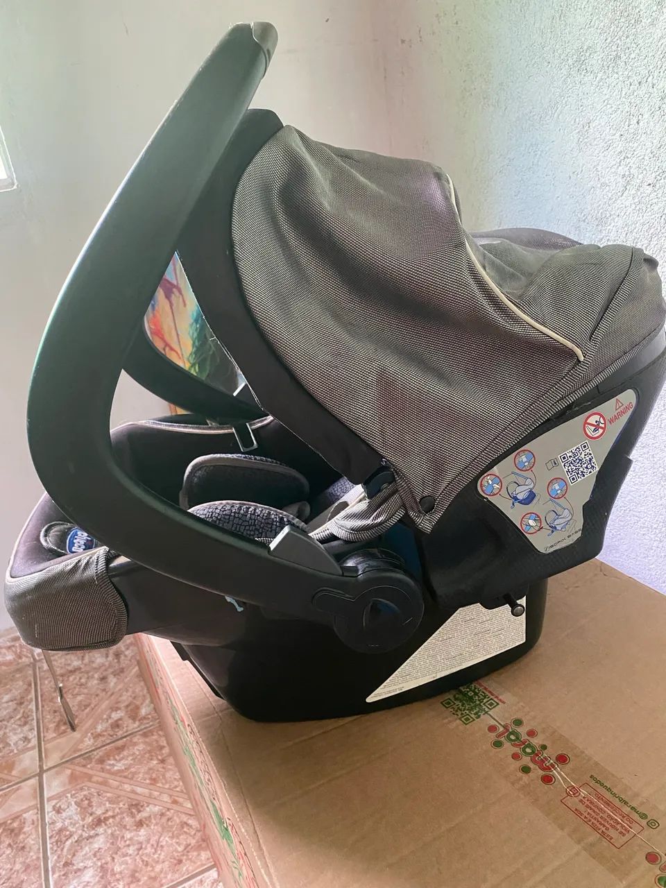 Carinho e bebê conforto