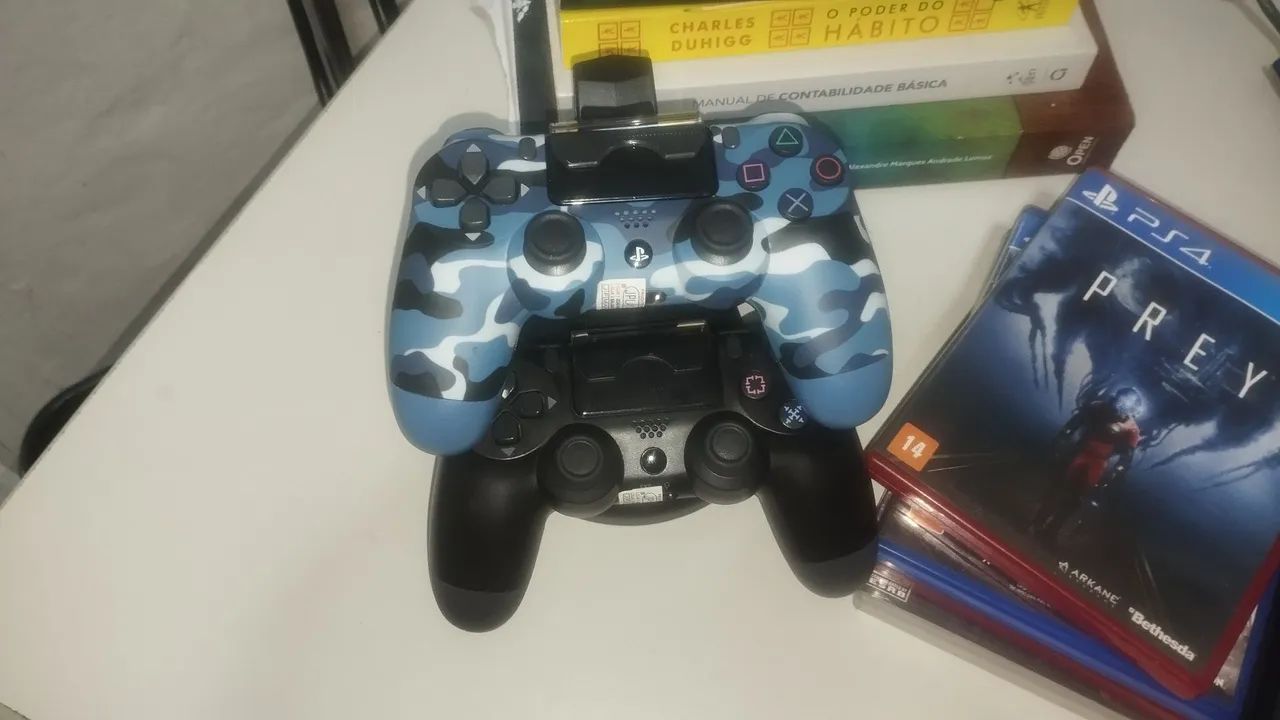 PS4 com caixa e jogos. - Foto 2