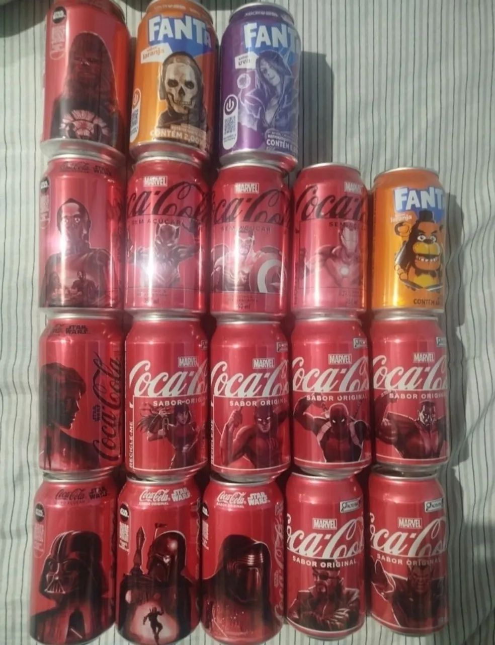 Latas colecionáveis da coca cola 