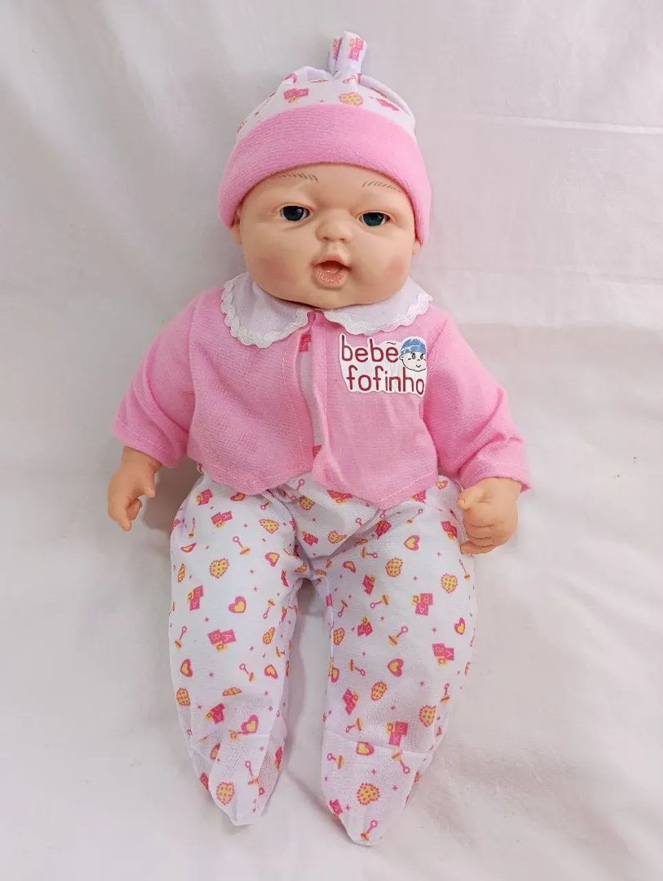 Boneca que chora ,sorri e dorme ,com chupeta e mamadeira com imã, completa  - Foto 2
