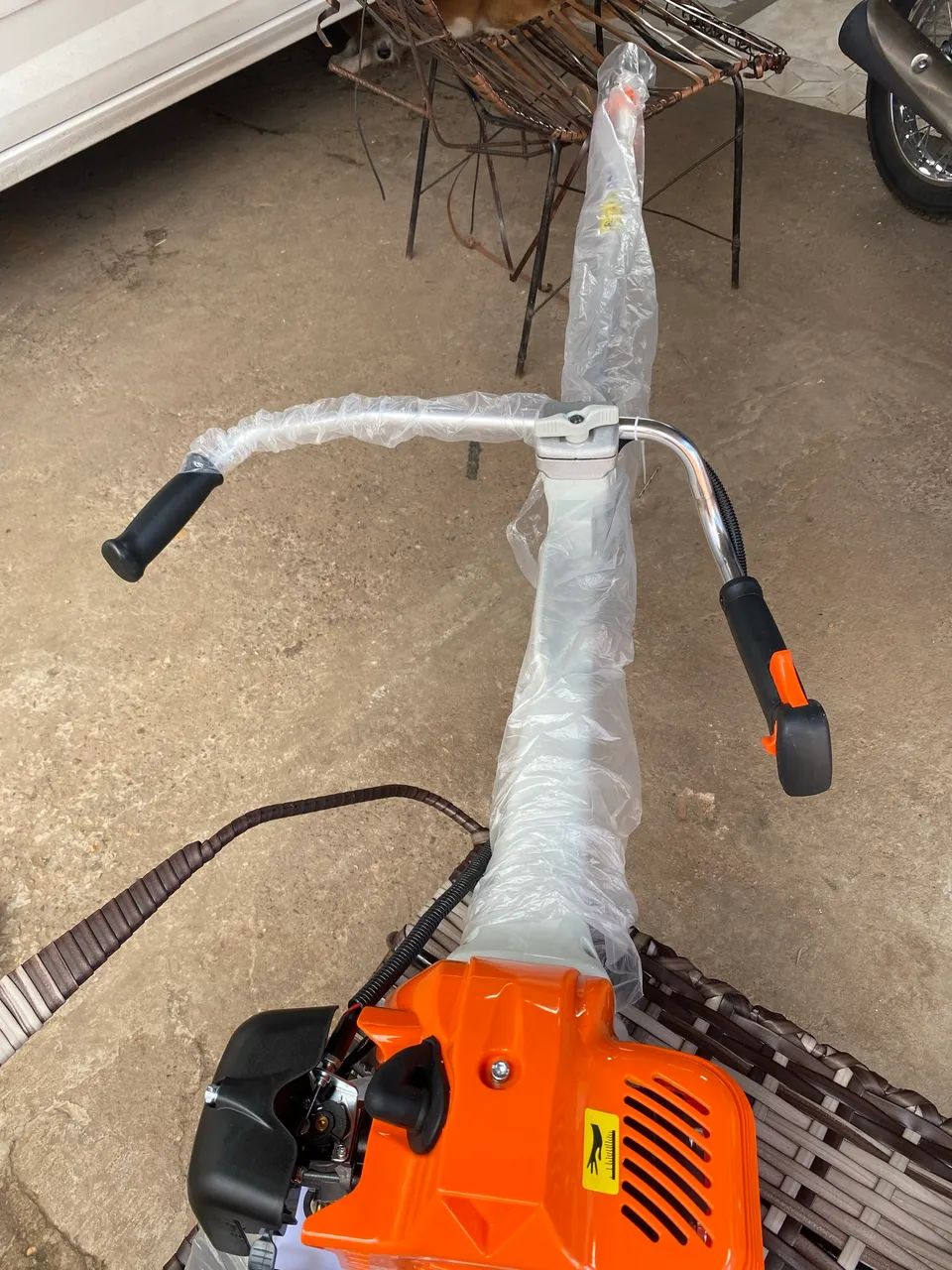 Rosadeira e motor serra novos  - Foto 3