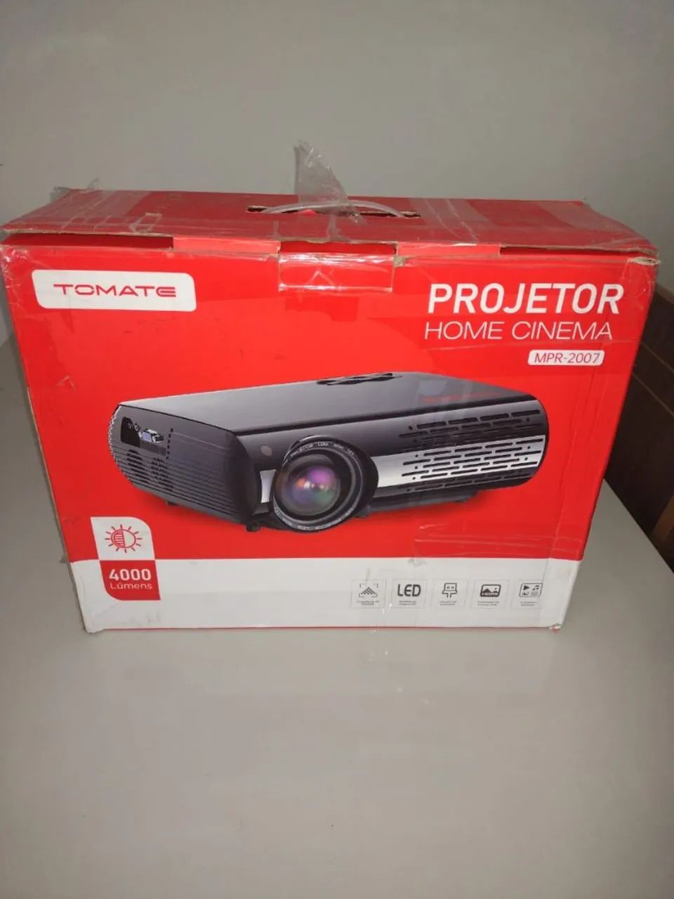 Vendo projetor marca tomate .