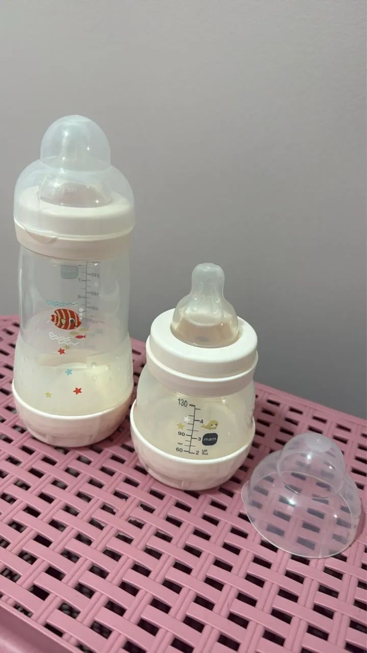 Mamadeira man e Philips pétala 