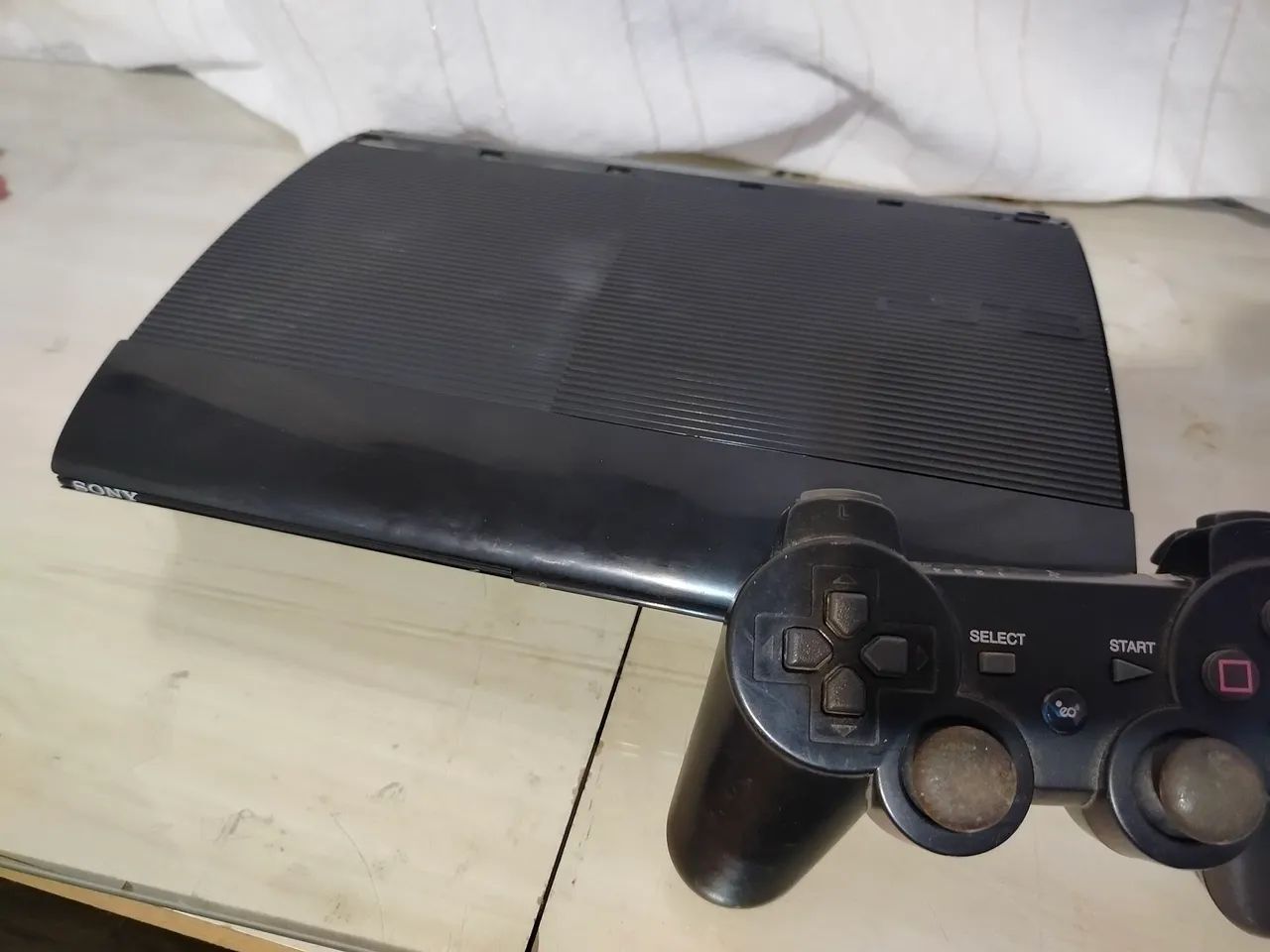 PlayStation 3 Super Slim no estado 