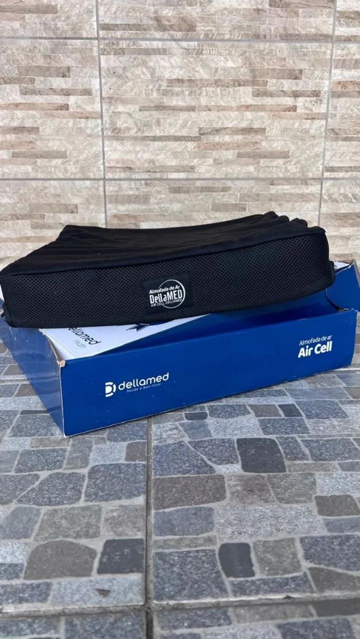 Almofada para a cadeira de roda antiscara.