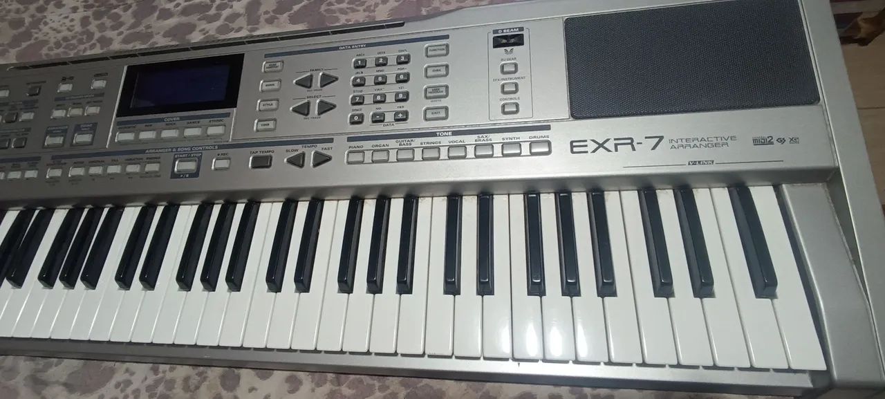 Teclado Roland EXR-7  - Foto 3