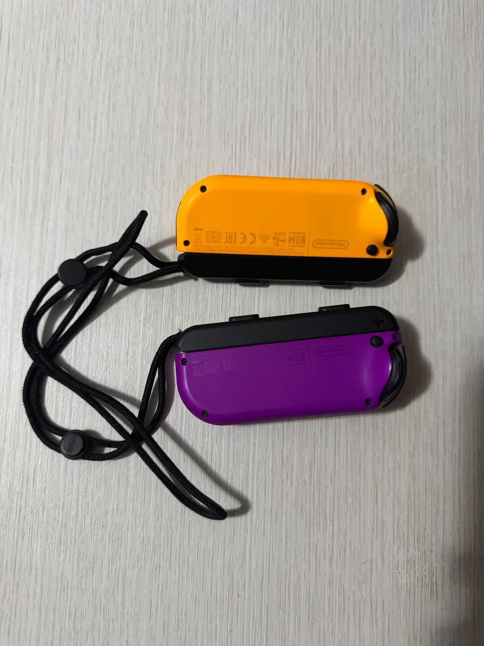 Joycons Nintendo Switch - Roxo e Laranja - Foto 2