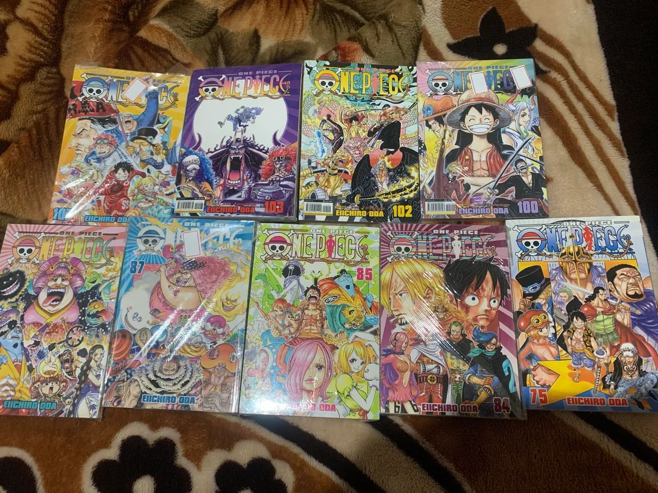 Lote de mangás One Piece (75,84,85,87,99100,102,103,107)