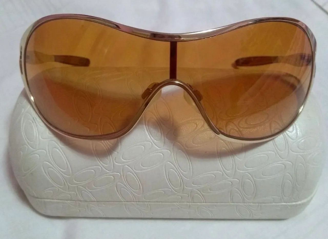 Óculos de sol oakley deception dourado 