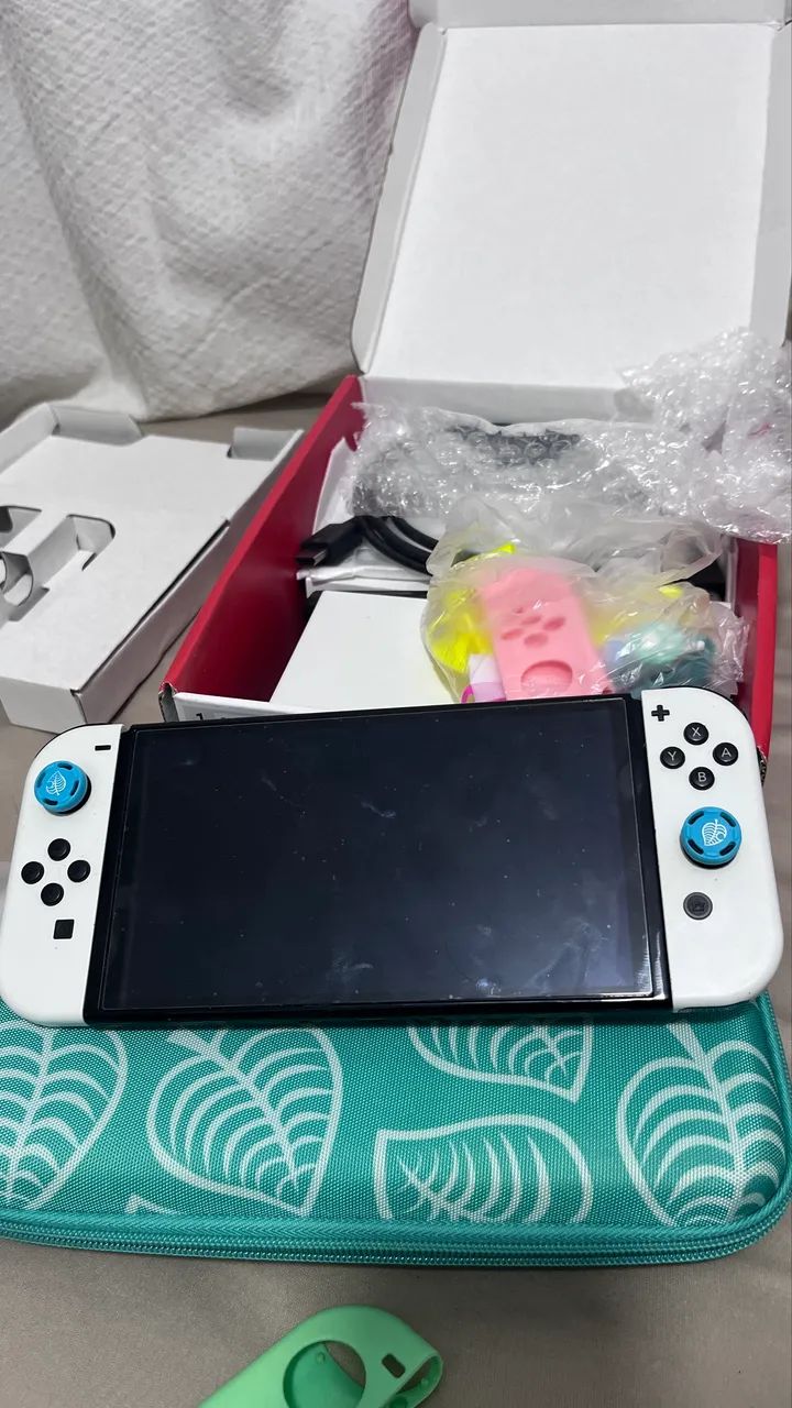 Nintendo Switch OLED impecável + caixa e acessórios - Foto 3