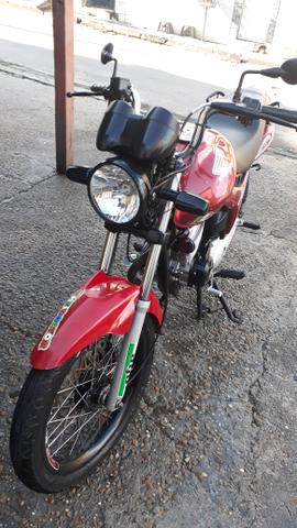 Vendo moto titan mixta top flex