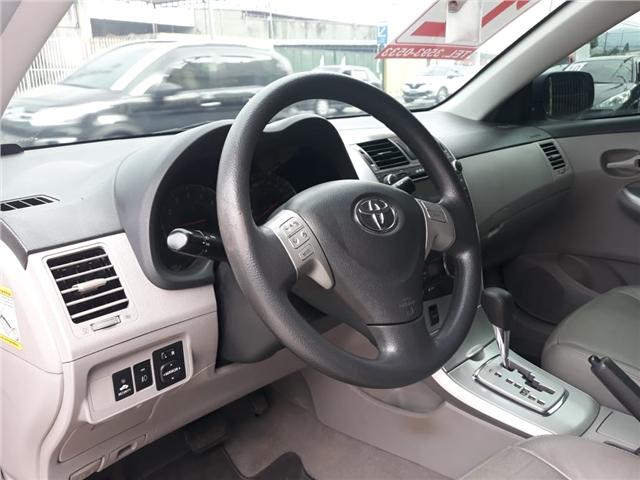 Toyota Corolla Toyota Corolla 1.8 gli 16v flex 4p automático - Foto 11