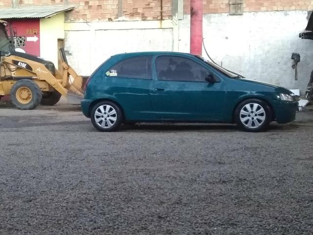 Vendo ou troco valor em dinheiro 7500vai com som - Foto 3