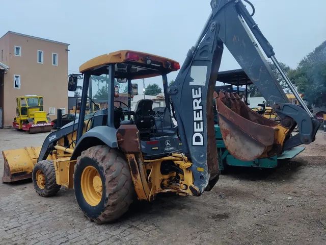 Retro escavadeira John deere 310k 4x4