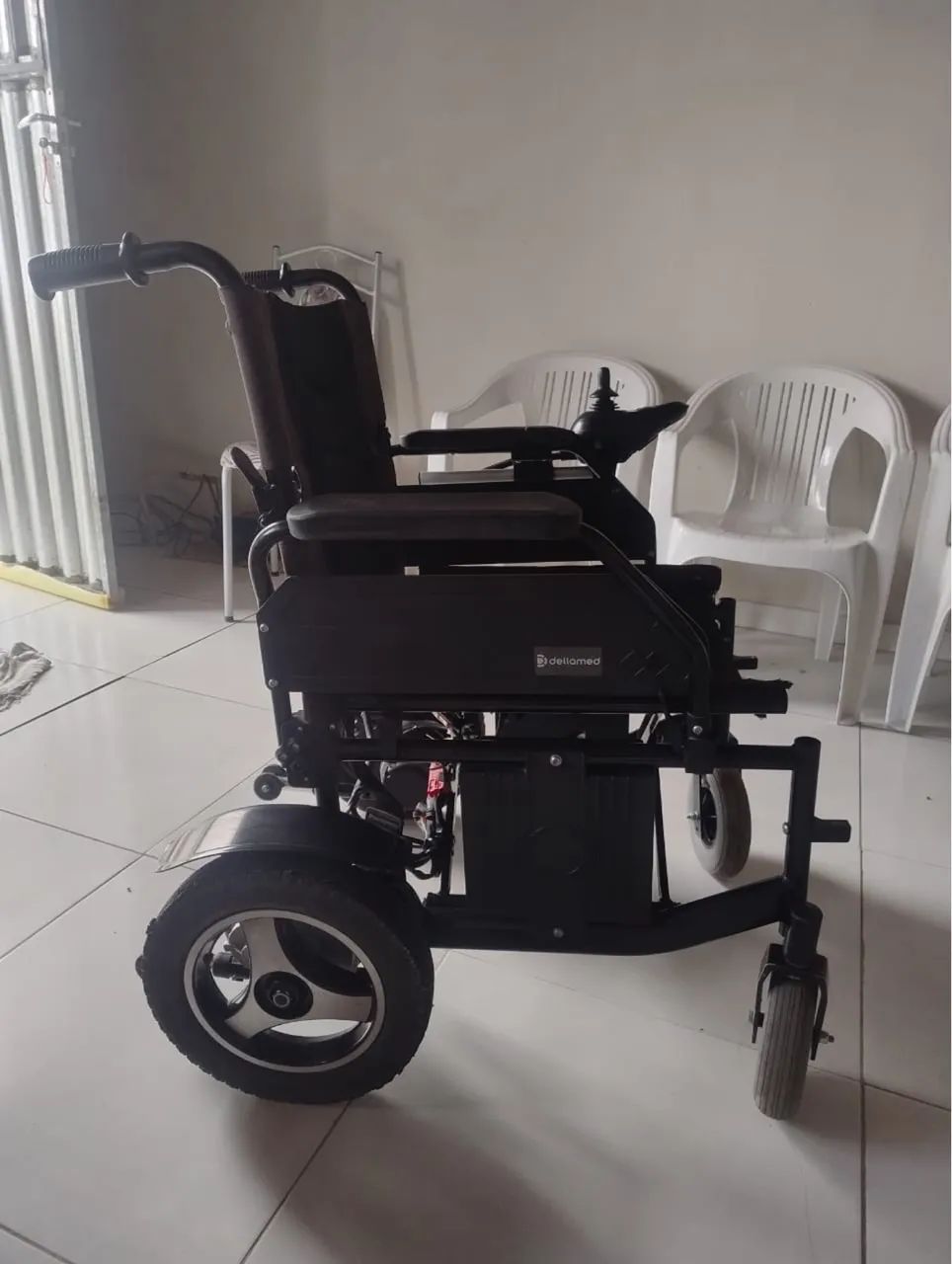 Cadeira de rodas automática/Defeito no elastique. 