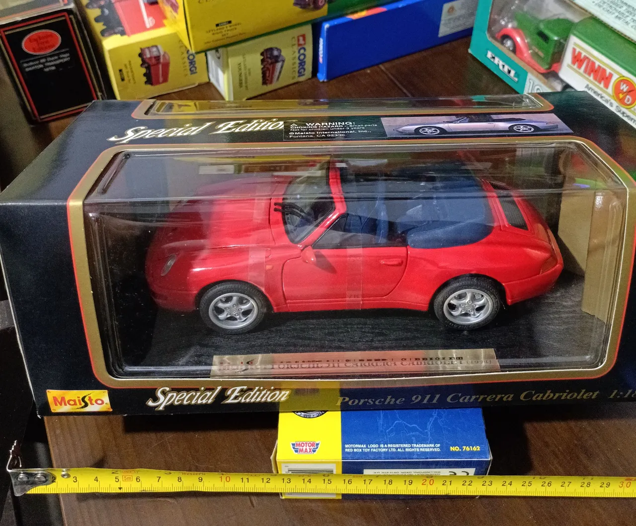 Miniatura 1:24 burago porsche 911 Carrera 1997 lacrada - Hobbies e
