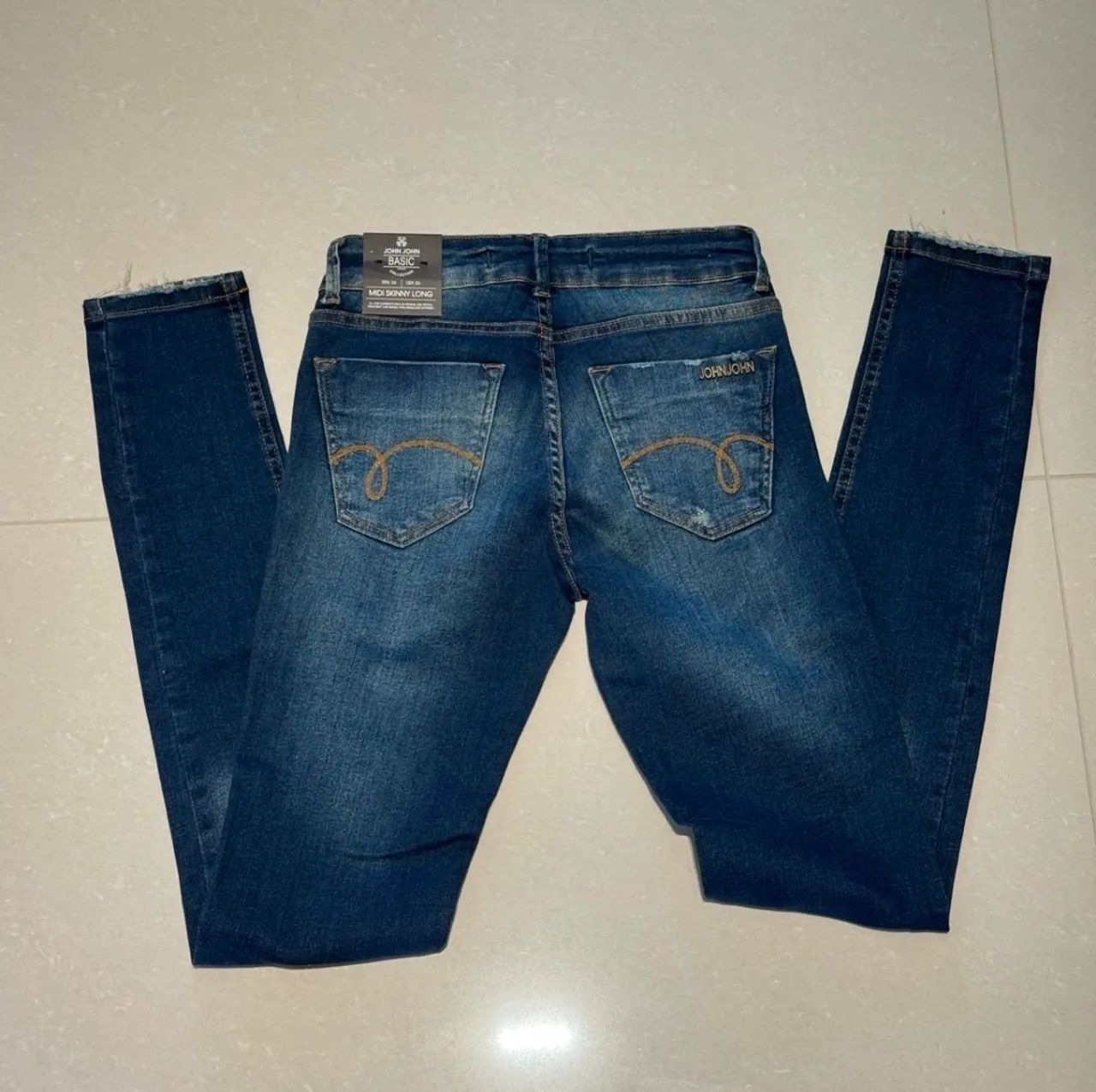 Calça jeans jonjon 