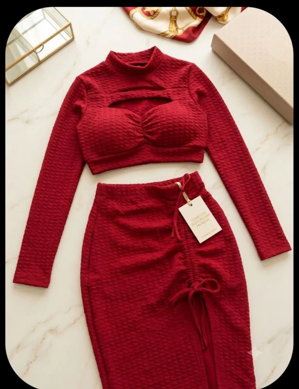Conjunto saia muda e cropt....