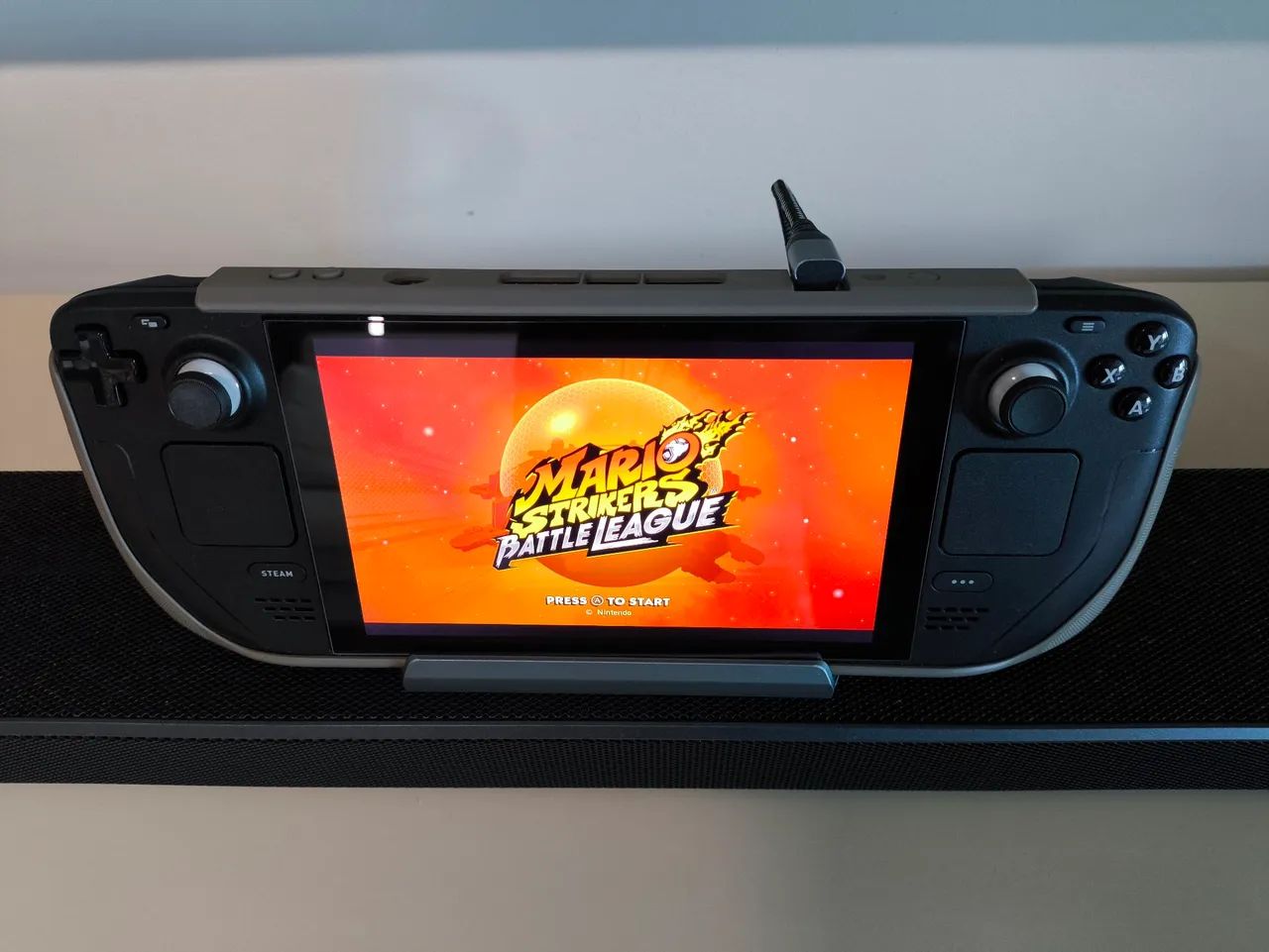 Steam Deck LCD 256gb + MicroSD Samsung Pro Plus 512gb + Grip Skull