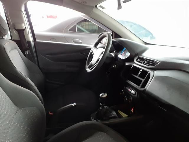 Vendo Onix LT 1.0 2013 - Completo * Entrada + 36x R$ 699,00 * C/ GNV - Foto 4
