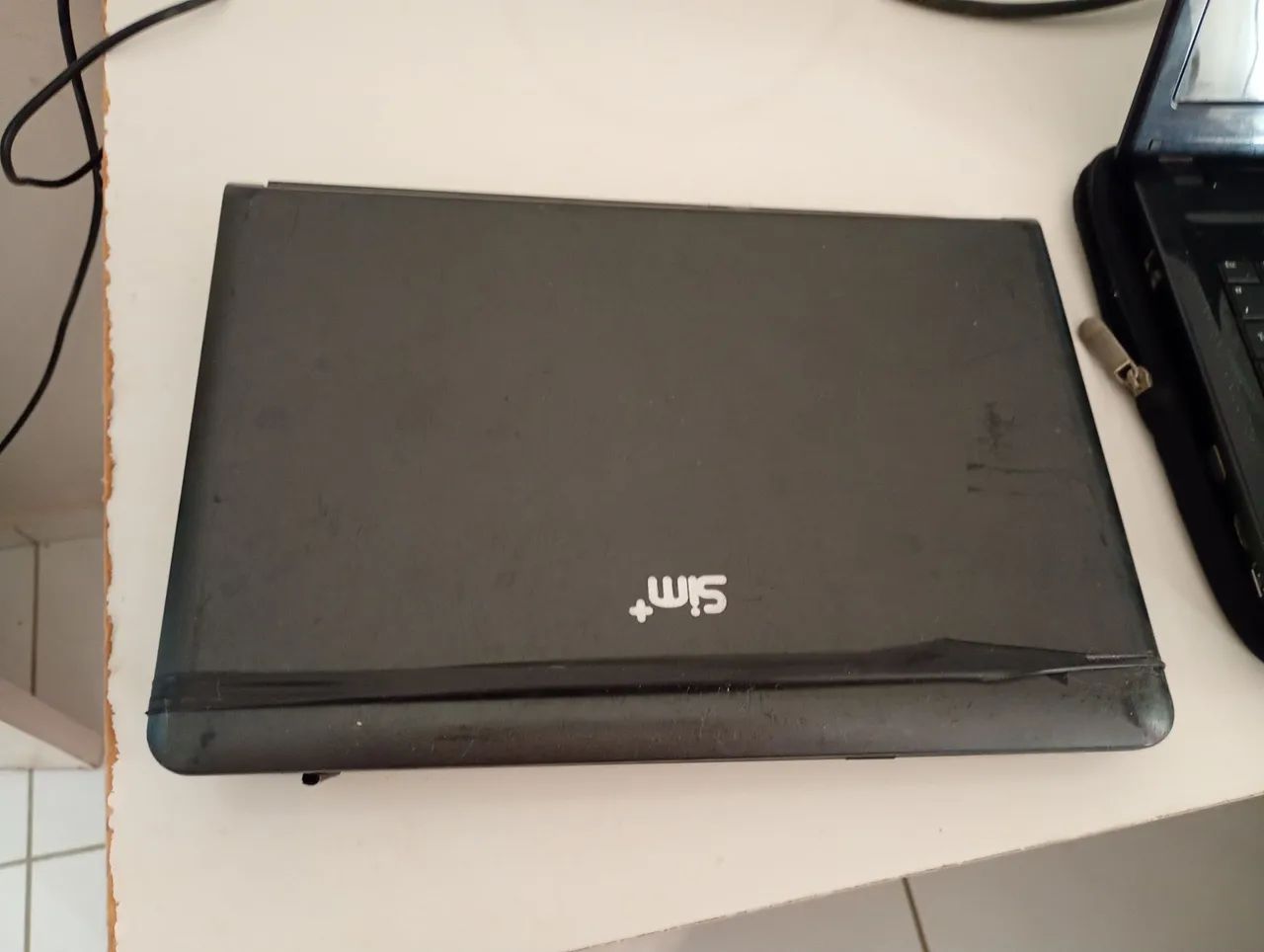 Vendo dois notebooks sim+,funcionam ,porém para retirada de peças. - Foto 4