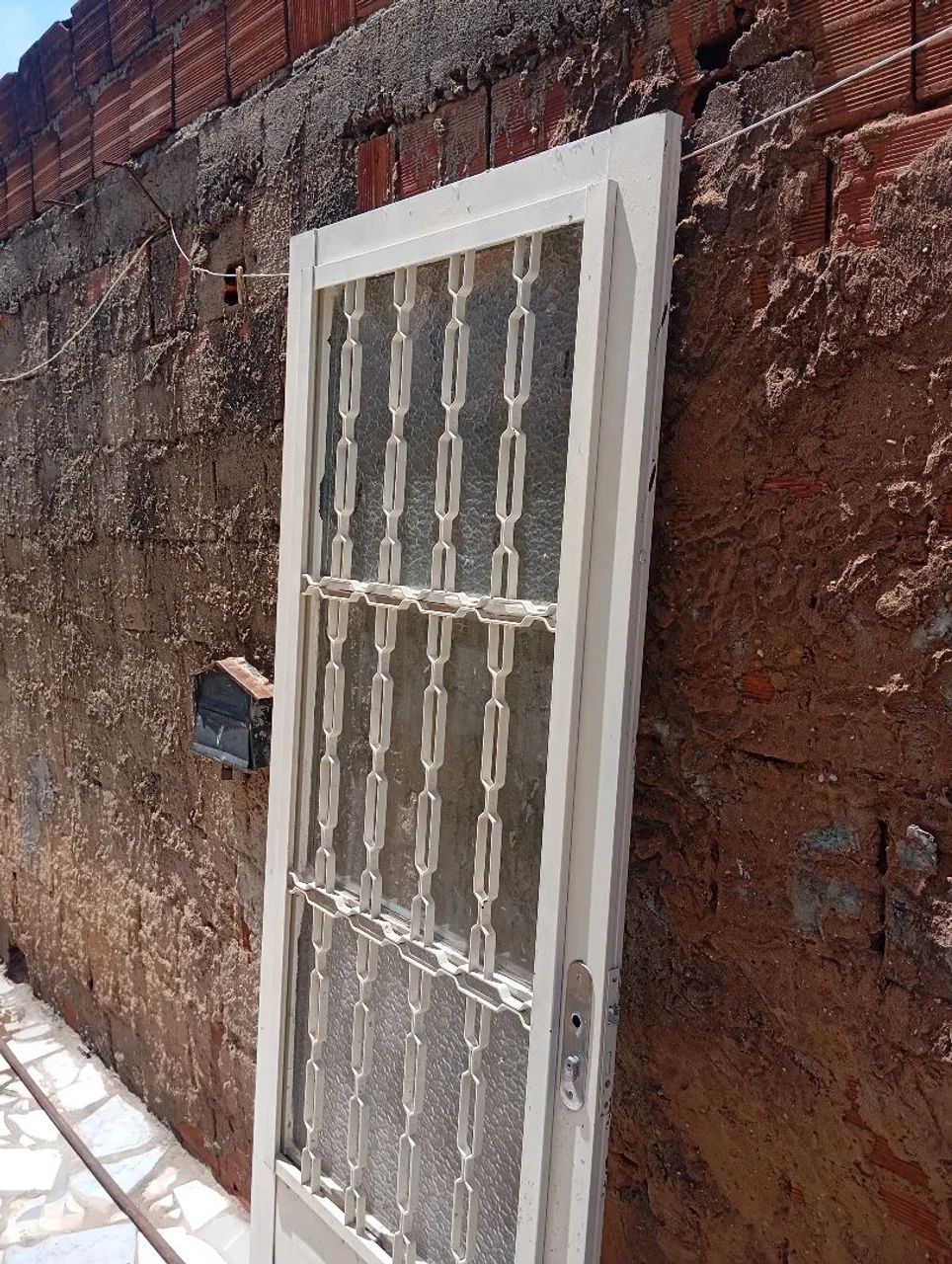 Porta social de giro em aço com postigo e grade - Foto 2
