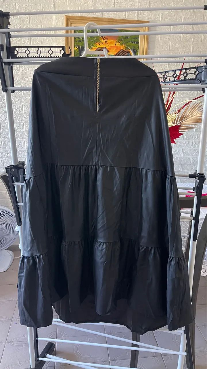 Linda saia de couro.