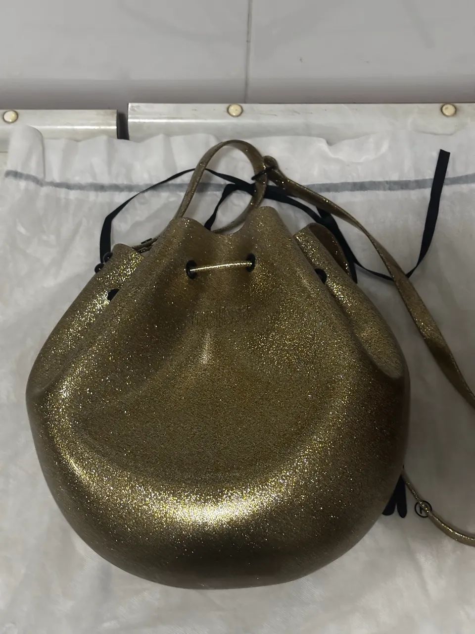 Bolsa Melissa dourada 