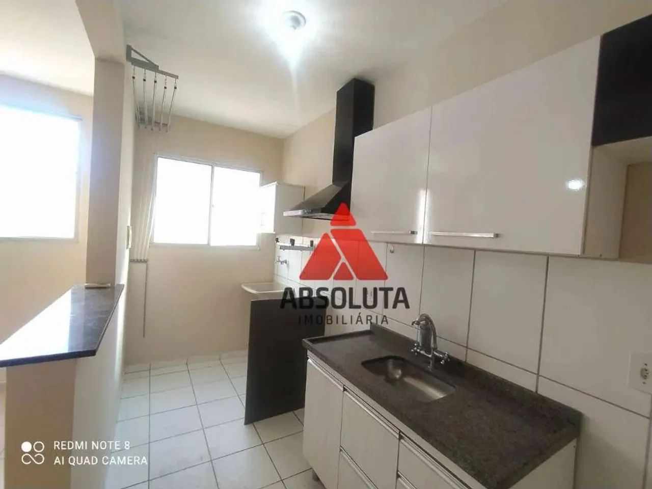 Apartamento com 2 dormitórios para alugar, 56 m² por R$ 1.541,75/mês - Catharina Zanaga - 