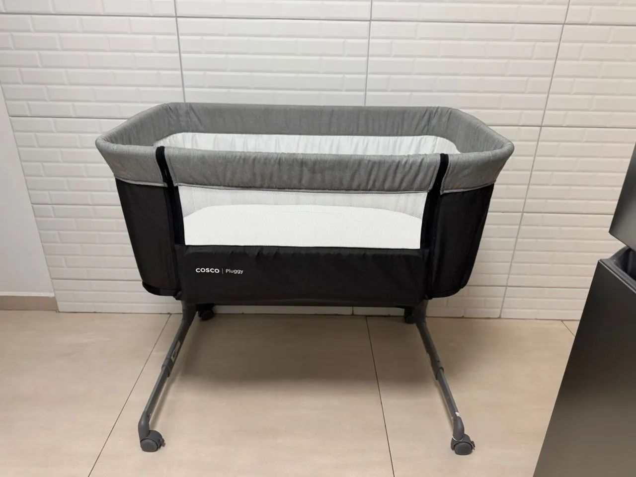 Cosco Moses Basket.