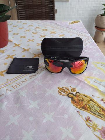 Vendo lindo oculos de sol Mormaii Acqua produto novo e original completo