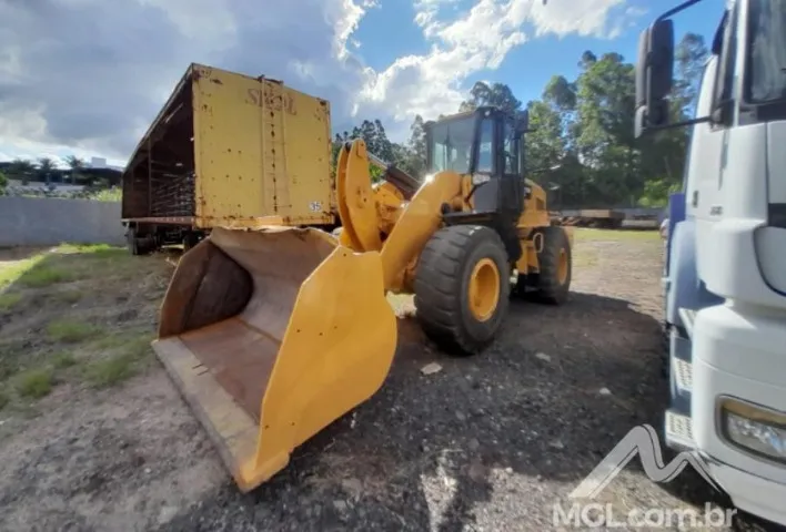 L)Pá carregadeira Cat 938