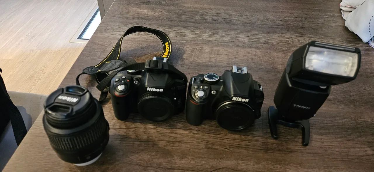 Câmeras Nikon d330 com Flash e Lente