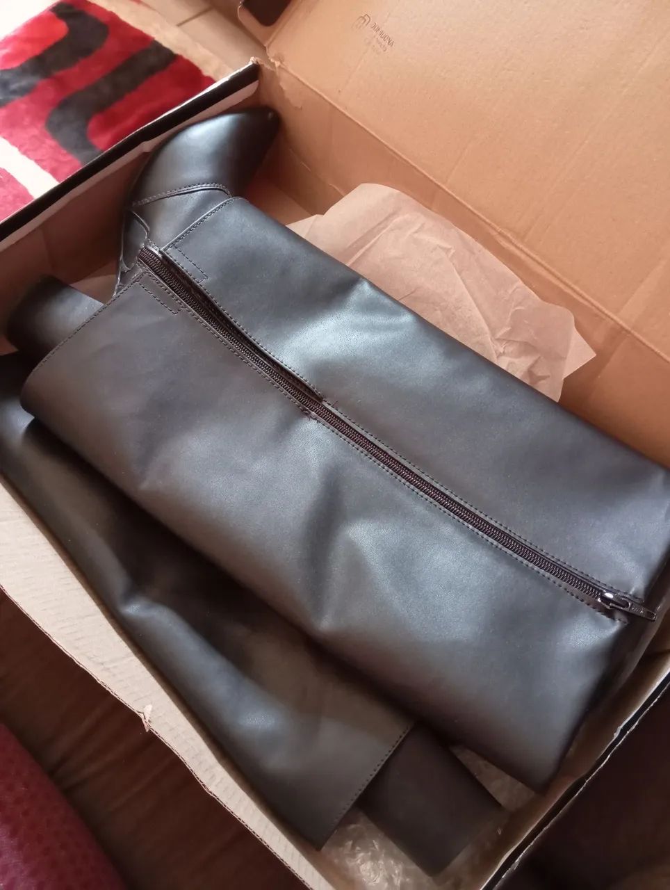 Vende-se bota preta