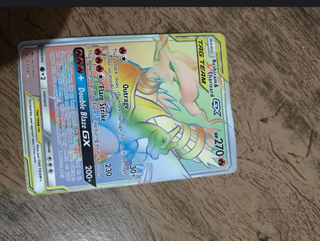 Carta pokémon reshiram Charizard gx 