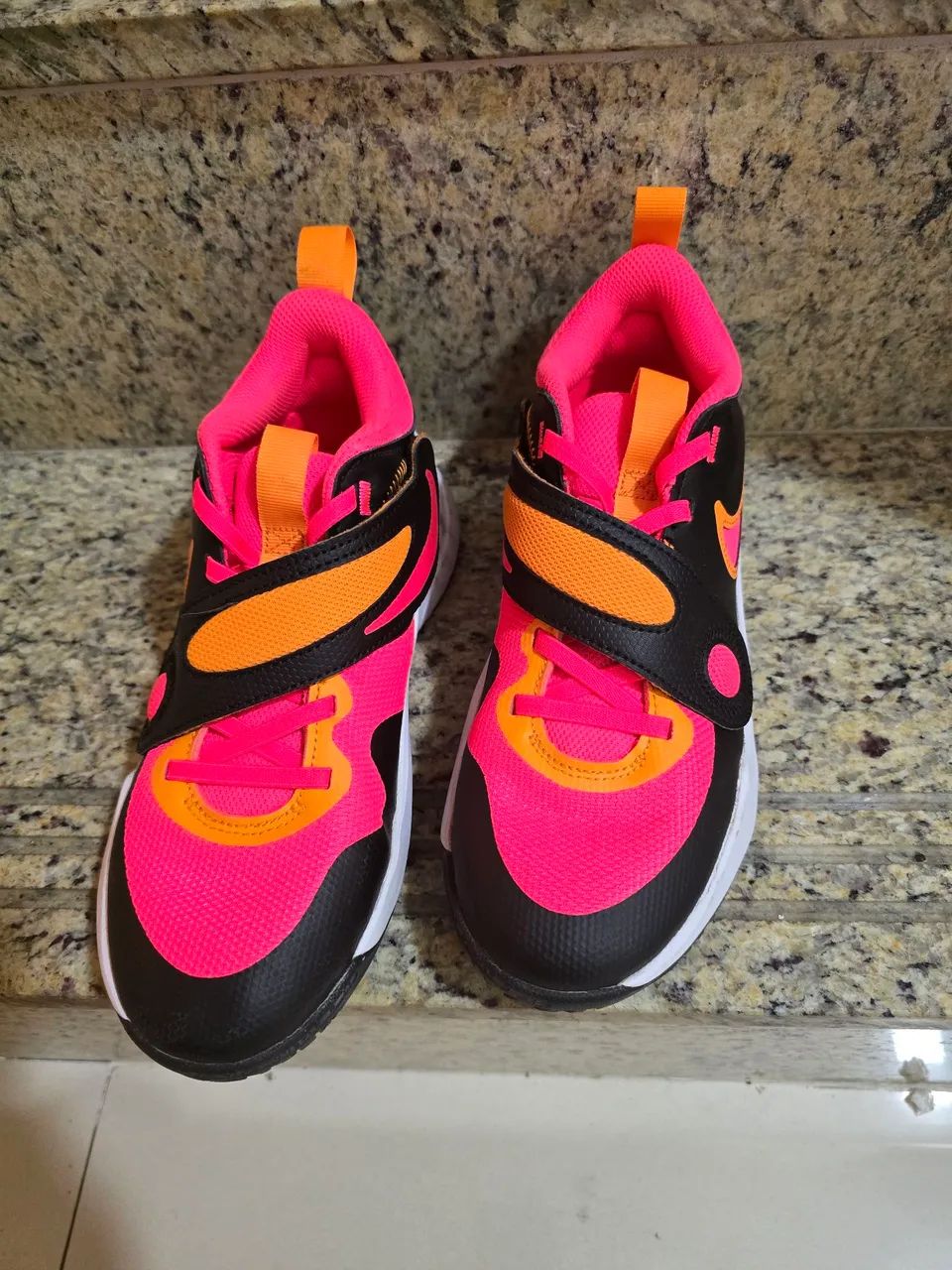 Tenis nike hustle d11