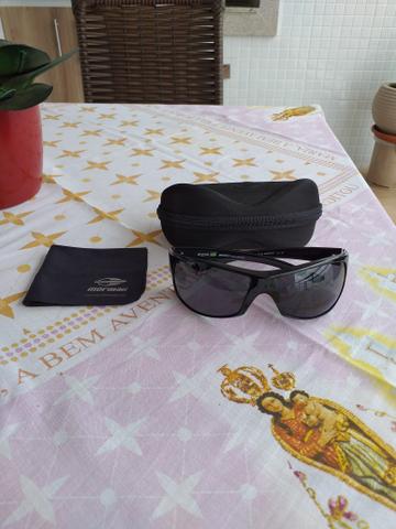 Vendo lindo oculos de sol Mormaii Acqua produto novo e original completo - Foto 3
