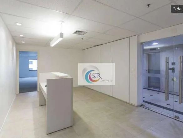 Sala comercial de 370 m² com 12 vagas de garagem, piso elevado com carpete, ar condicionad