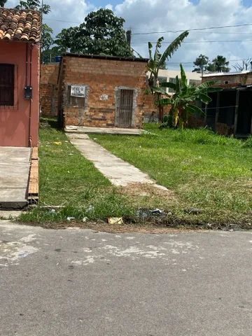 TERRENO COM UMA CASA
