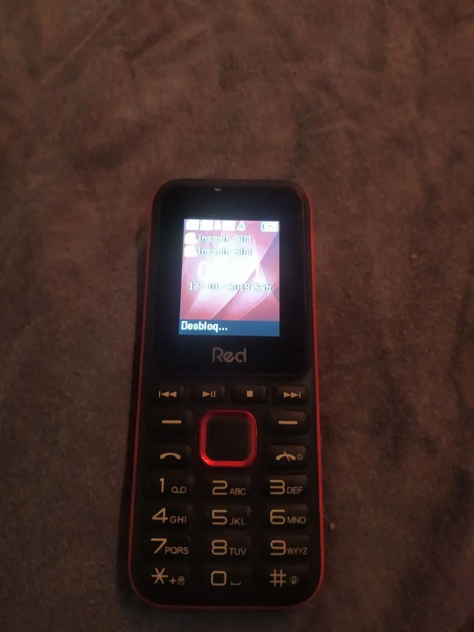 Vendo celular de Botão Novo