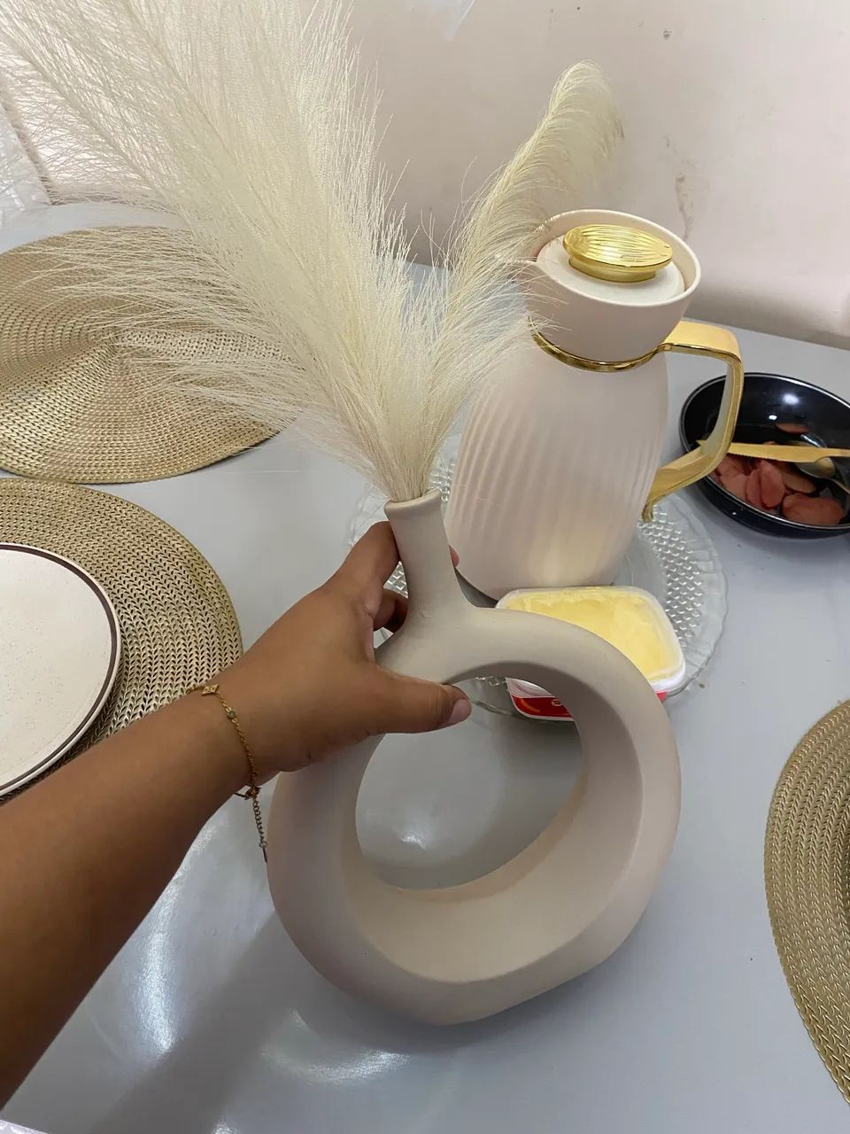 Vaso decorativo com plumas