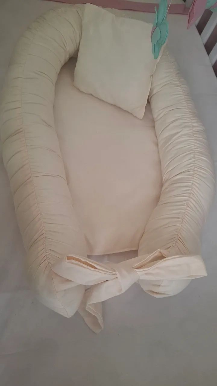 Ninho redutor de berço 