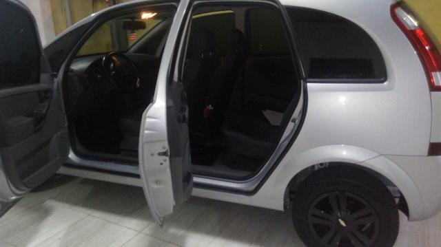 Meriva completa tudo em dia penus novos e revisões tudo ok venha comferir