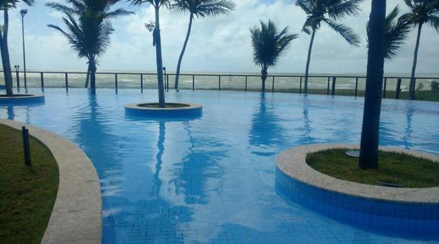 Apto mobiliado ,beira mar,ponta de campina,pé na areia ,condomínio clube,2 quartos
